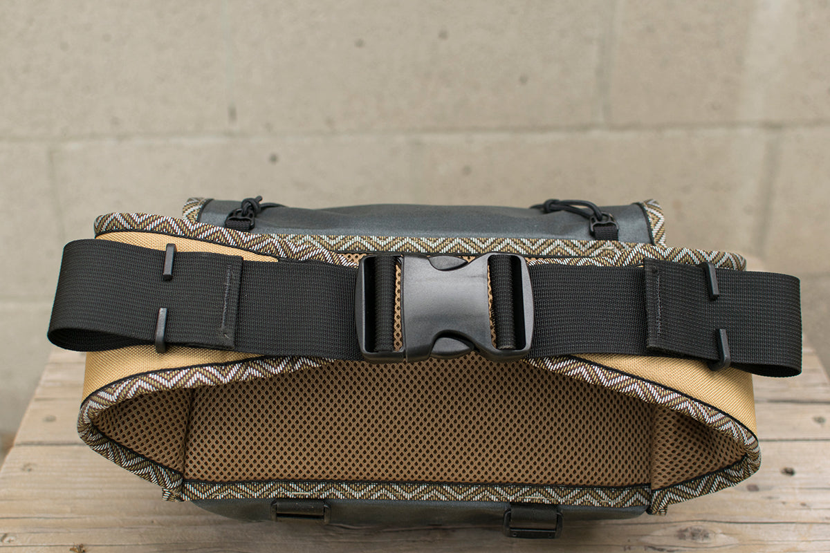 Back view of grey Big Dumpling hip pack with Great Horned Owl trim tape.