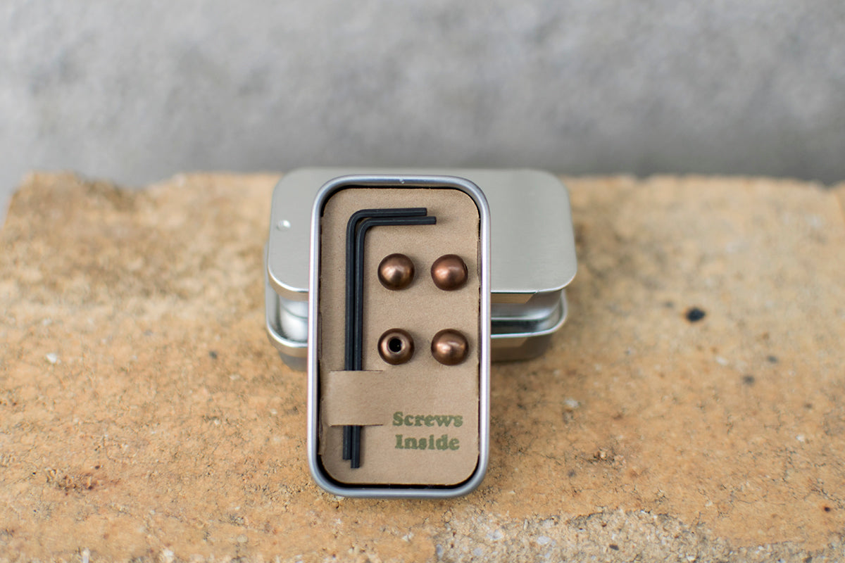 Small tin with four brown cable cherries and two Bondhus hex keys.