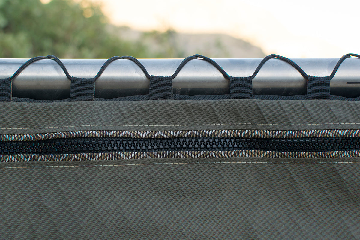 Great Horned Owl trim tape detail along the zipper, with top tube lace up