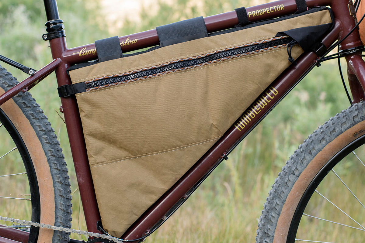 Full Triangle frame bag detail: zipper, trim tape and top tube lace up