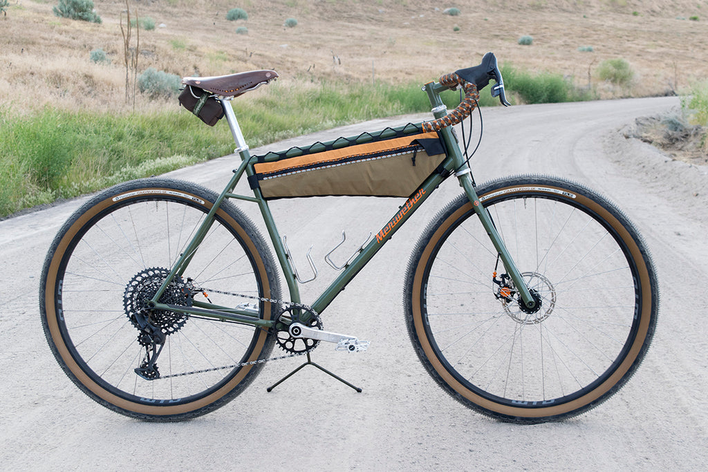 Half custom frame bag fitted to a gravel bike
